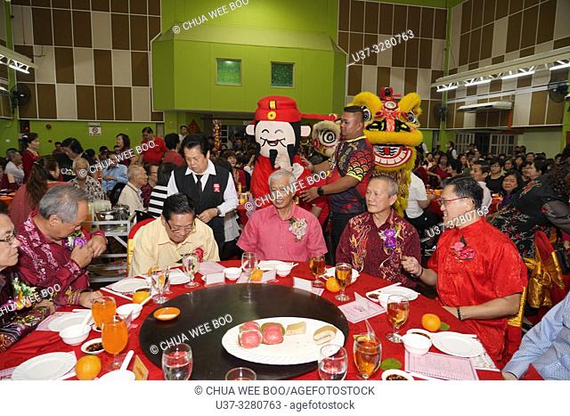 The arrival of Kuching City North Mayor to attend the Chinese New Year dinner at Sungai Maong Community Hall, Kuching, Sarawak, Malaysia