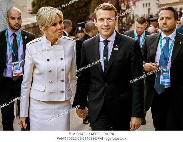 France's president Emmanuel Macron and his wife Brigitte can be seen on their way to a concert at the Greek Theatre in Taormina, Italy, 26 May 2017