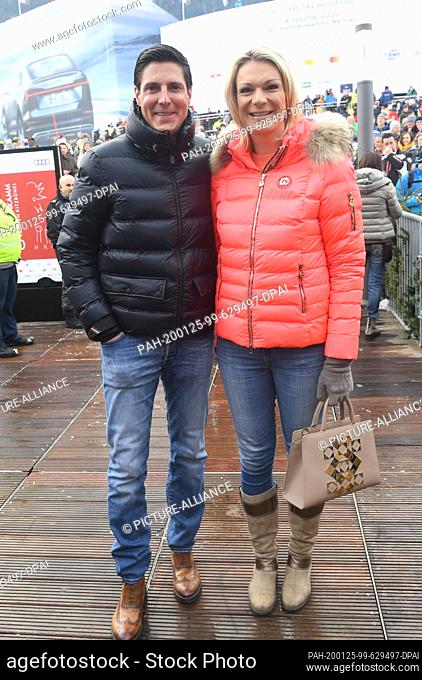 25 January 2020, Austria, Kitzbühel: Former ski racer Maria Höfl-Riesch and her husband Marcus Höfl show up in the finish area of the Hahnenkamm race before the...