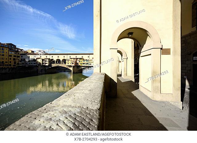 Florence. Italy. The Vasari Corridor runs alongside the River Arno and crosses via the Ponte Vecchio