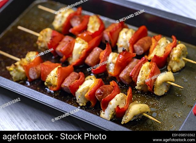 Chicken skewer with red pepper and sausage