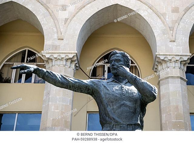 A statue of famous Aserbaijanian football referee Tofiq Bahramov facing the Tofiq Bahramov Stadium during the Archery events at Baku 2015 European Games in Baku