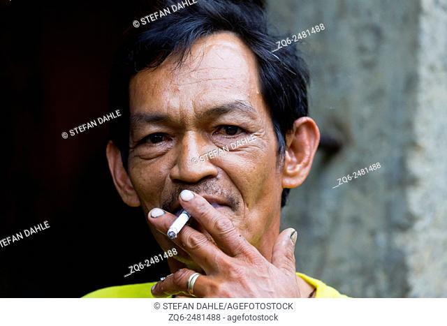 Smoking Man in Puerto Princesa, Palawan, Philippines