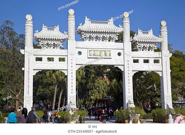 White gateway on the approach to the Po Lin Monastery, Lantau Island, Hong Kong