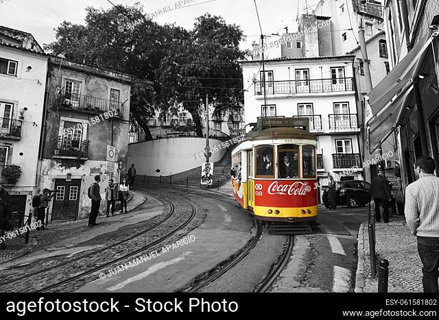 Photograph in black and white mixed with colour of Red Tram in Lisbon, Portugal, Europe