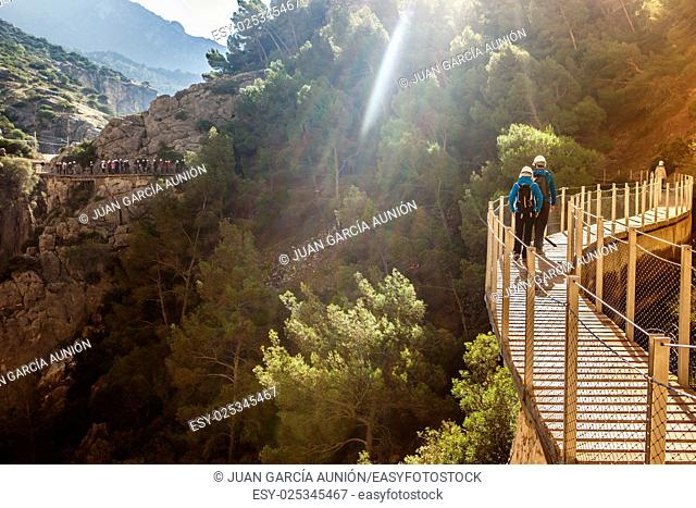 Visitors walking along the footbridge of Caminito del Rey path, Malaga, Spain