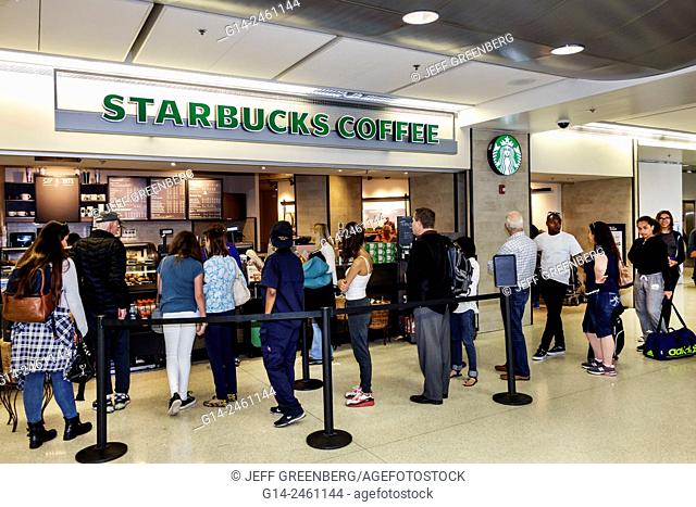 Florida, Miami, International Airport, MIA, inside, terminal, concourse, gate area, Starbucks Coffee, line, queue, customers, counter