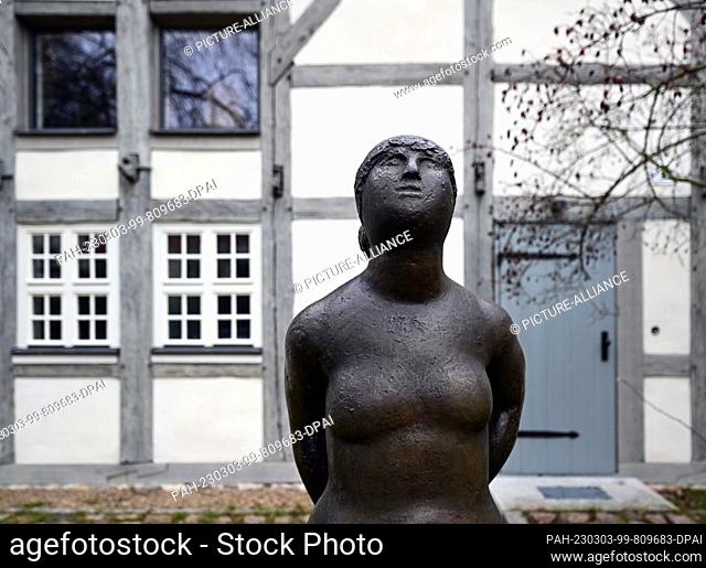 02 March 2023, Brandenburg, Bernau bei Berlin: The sculpture ""Standing Nude II"" by Wieland Förster (bronze, 1964) has stood behind the Kantorhaus since 2021