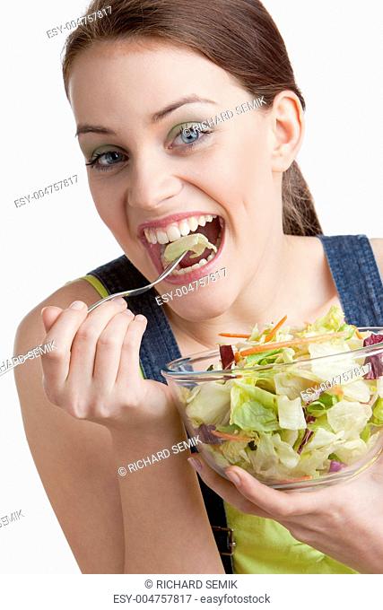 portrait of woman eating salad