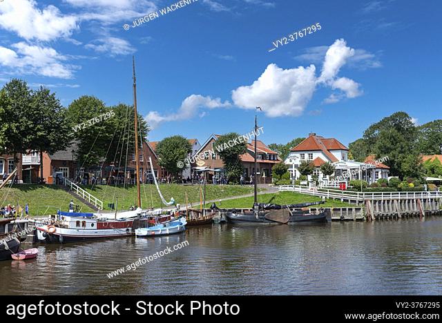 Museum harbor with traditional flatboat sailors, Carolinensiel, Lower Saxony, Germany, Europe
