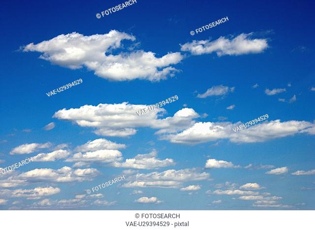Cumulus clouds in blue sky
