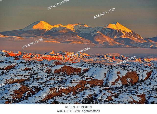 Fresh snow and the La Sal Mountains near sunset, Arches Natinal Park, Utah, USA