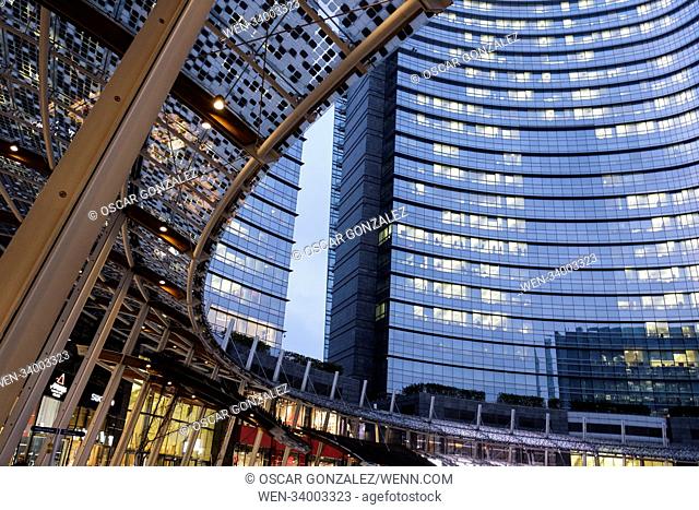 Piazza Gae Aulenti of Milan, Italy. designed by the Argentine architect Cesar Pelli, inaugurated in 2012. It is a circular elevated square