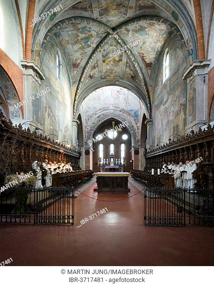 Cistercian monks in prayer in the Gothic Chiaravalle Abbey, Abbazia Chiaravalle Milanese, Rogoredo, Milan, Lombardy, Italy