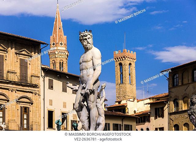 Italy, Toscana (Tuscany), Firenze (Florence) . The Fountain of Neptune by Bartolomeo Ammannati, on the background the bell-towers of Bargello and Badia...