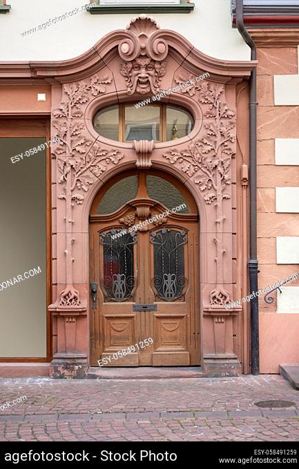 historic ornamented door seen in Miltenberg, a town in Lower Franconia, Bavaria, Germany