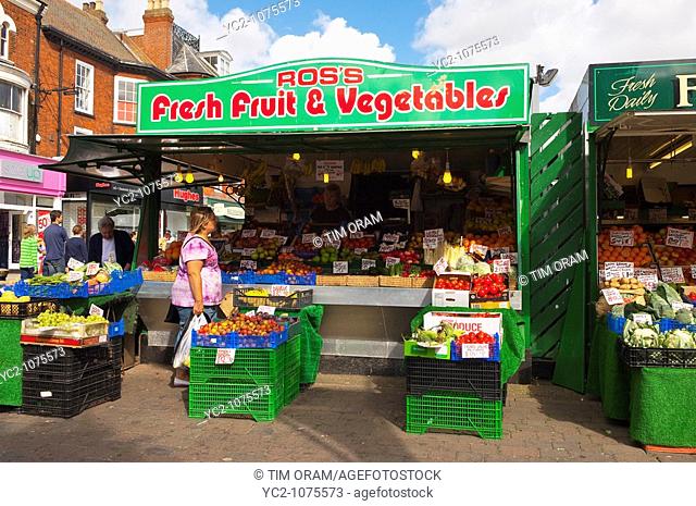 A fruit & vegetables stall at the market in Great Yarmouth , Norfolk , Uk