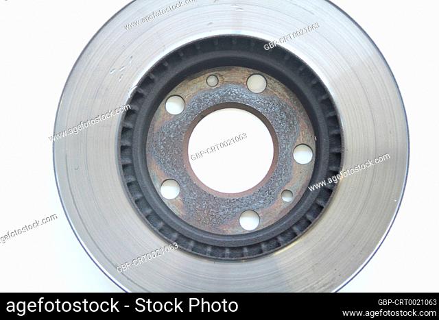 One old car brake disc isolated on white background, São Paulo, Brazil