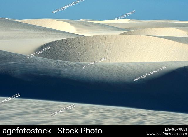 Lencois Maranhenses National Park, Barreirinhas, Brazil, low, flat, flooded land, overlaid with large, discrete sand dunes with blue and green lagoons