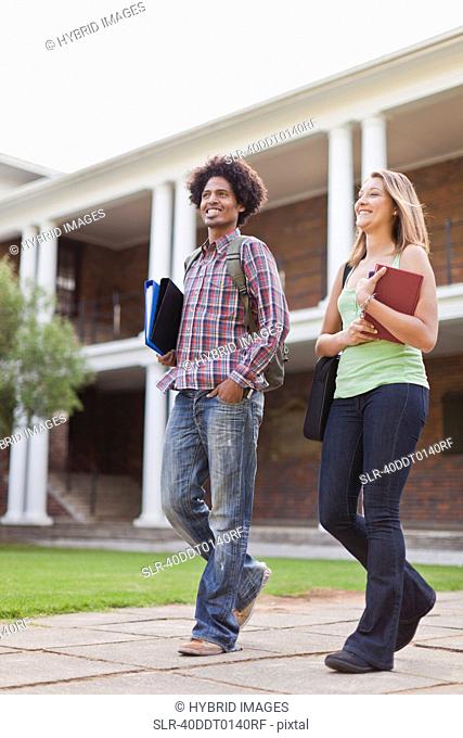 Students laughing together on campus