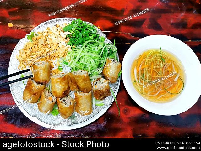 27 February 2023, Vietnam, Hanoi: Vietnamese spring rolls (Nem Ran Ha Noi) are on a plate. Photo: Alexandra Schuler/dpa. - Hanoi/Asia/Vietnam
