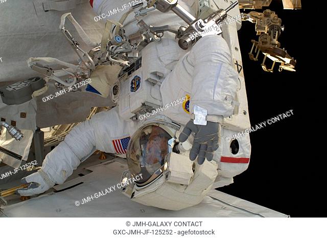 NASA astronaut John Danny Olivas, STS-128 mission specialist, participates in the mission's second session of extravehicular activity (EVA) as construction and...