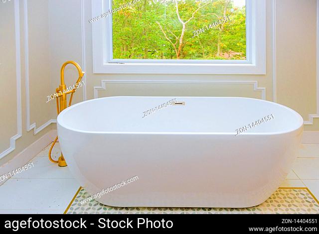 Large furnished bathroom in luxury home with bathtub white installing custom in master bathroom