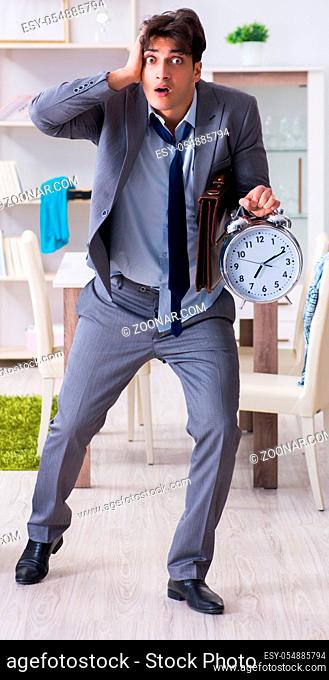 The businessman late for office due to oversleeping after overnight