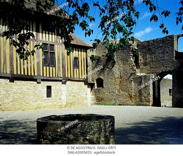 Glimpse of the inner bailey with the lord's dwelling place and the well, Chateau de Crevecoeur, Crevecoeur-en-Auge, Lower Normandy