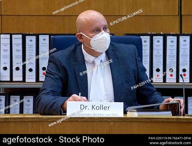 19 January 2022, Hessen, Frankfurt/Main: Presiding Judge Christoph Koller opens the trial against a Syrian-born doctor. Another trial for crimes against...