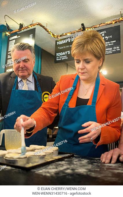 SNP Leader Nicola Sturgeon joins John Nicolson on the campaign trail in East Dunbartonshire and visits local business Table 13 Express, to make haggis pies