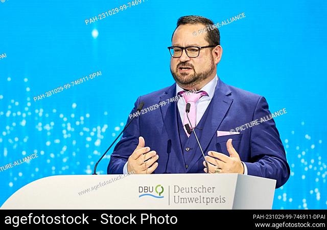 29 October 2023, Schleswig-Holstein, Lübeck: Alexander Bonde, Secretary General of the DBU, stands on stage during the presentation of the German Environmental...
