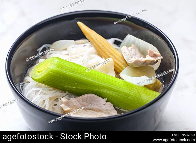 soup pho with vegetables and rice noodles
