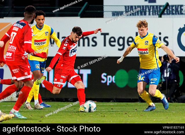 Kortrijk's Massimo Bruno and Westerlo's Arthur Piedfort fight for the ball during a soccer match between KV Kortrijk and KVC Westerlo