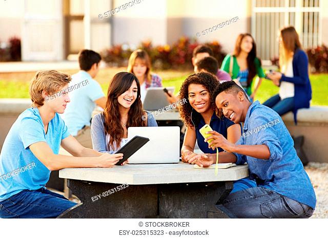 High School Students Hanging Out On Campus