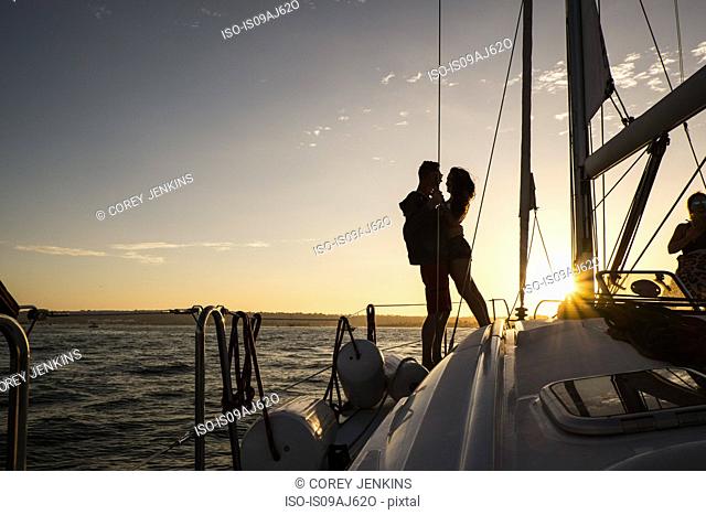Couple on yacht, silhouette