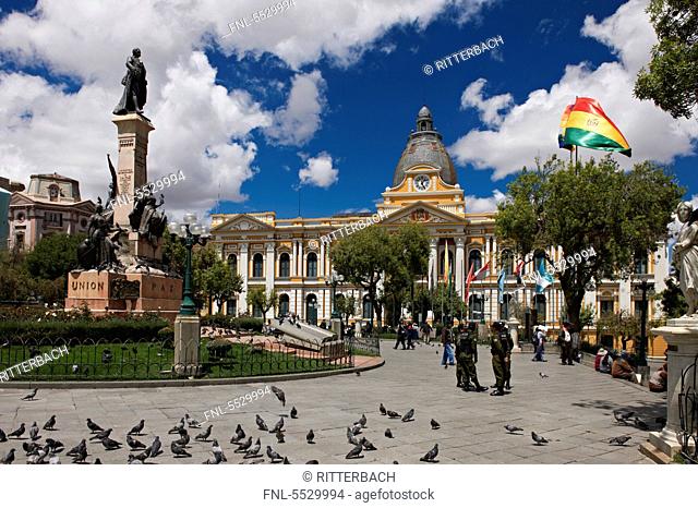 Plaza Murillo with pigeons, statue and Parliament Building, La Paz, Bolivia