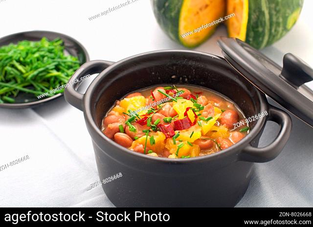 Soup with beans and squash with chilli powder, italy