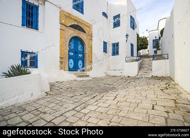 The cobbled streets of Sidi Bou Said. The blue and white tourist attraction overlooking the Mediterranean Sea. Tunisia, Africa