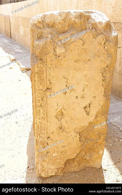 Egypt, Saqqara, tomb of Horemheb, second court, this block bears a hieroglyphs line of a stela nearby, as if an unexpected cast was done
