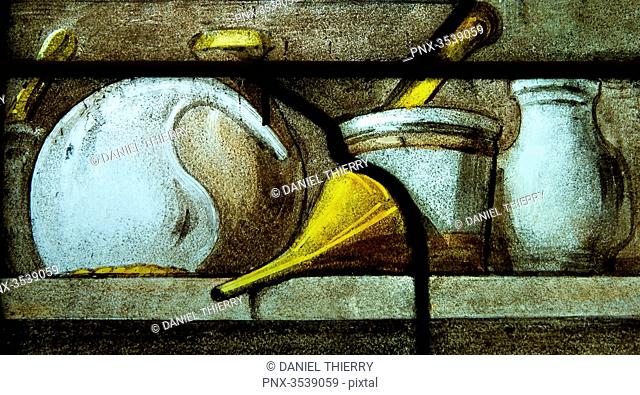 France. Paris 6th district. Avenue de l'Observatoire. Faculty of pharmacy. Detail of a stained-glass window representing the instruments of a chemist