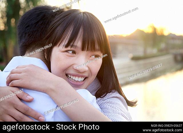 Happy Young Couple Hugging