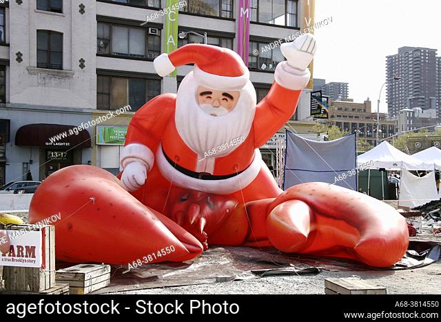 An inflatable symbiosis between Santa and lobster in New York. USA