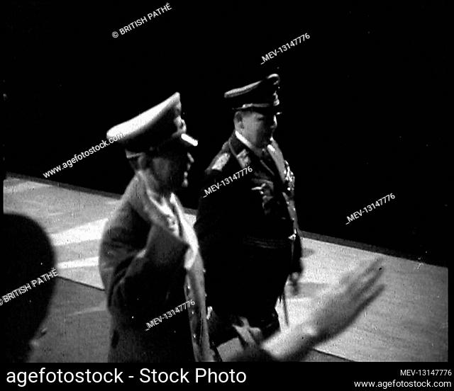 Adolf Hitler, the German Leader, With Raised Arm and Herman Goering Walking Past A Soldier Giving the Nazi Salute at Lehrter Train Station in Berlin - Berlin
