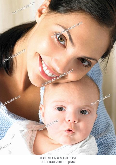 Mother with her baby-boy, smiling