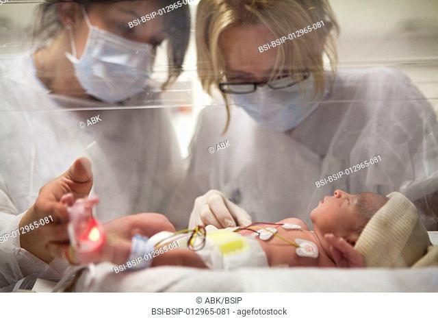 Photo essay at the maternity of Saint Maurice hospital in France. Birth of premature twins. After the childbirth the twins are placed in the department of...