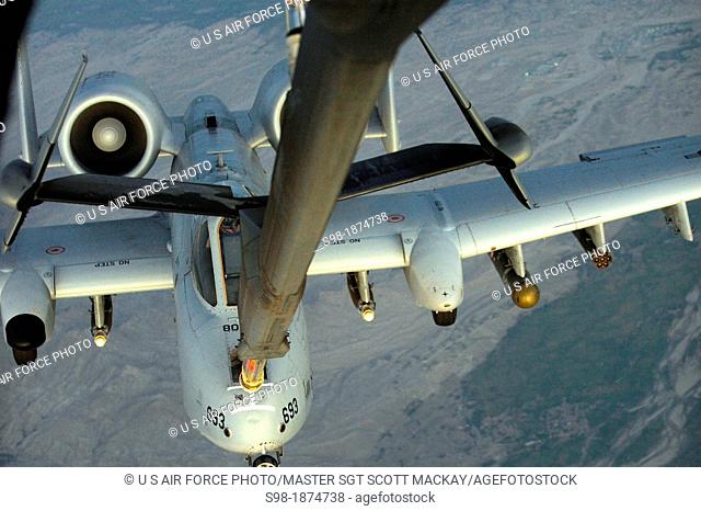 An A-10 Thunderbolt II pulls up behind a KC-10 Extender to be refueled in Southwest Asia on Sept  18, 2012  The KC-10 is an advanced tanker and cargo aircraft...
