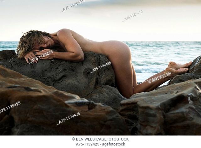 Nude woman on the beach