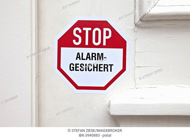 Stop, alarm system, sticker on the door, Germany