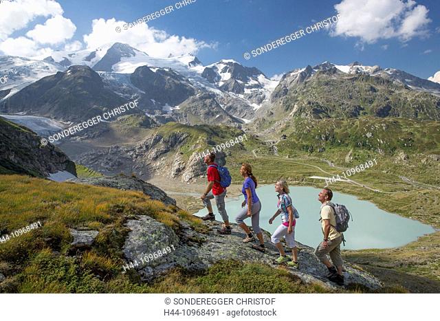 Susten Pass, hiker, lake Stein, Steinsee, Susten, canton Bern, glacier, ice, moraine, footpath, walking, hiking, mountain lake, Switzerland, Europe, group, man